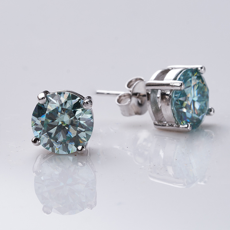 S925 plata esterlina pernos de orejas de cuatro garras para mujeres 1 quilates pernos de orejas de piedra de moissan azul fabricantes de aretes de orejas para la tracción transfronteriza