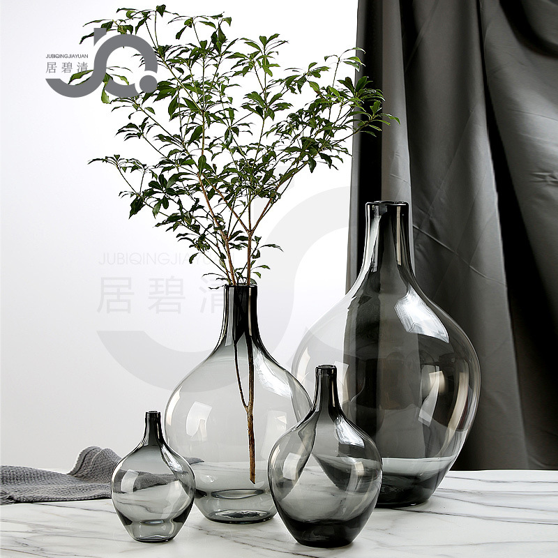 Nordic minimalist large-bellied monochromatic glass vase chime with Abies and pomegranate floral arrangement hydroponic floor-standing large model