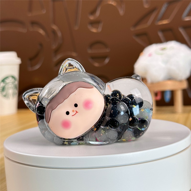 Nocturno explosivo gato macarón super lindo dibujos animados arena flotante en aceite caja ciega pequeña bolsa ciega adornos al por mayor