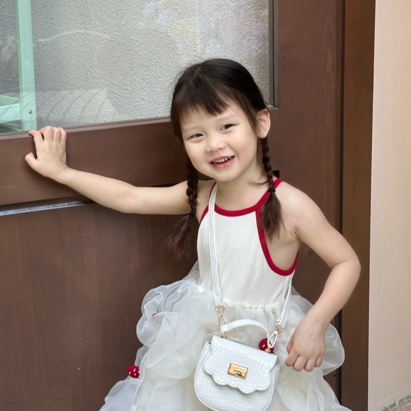 Bolso de hombro para niña de color sólido simple mini bolso de bebé lindo 2025 nuevo bolso de mensajero para niños de comercio exterior marea