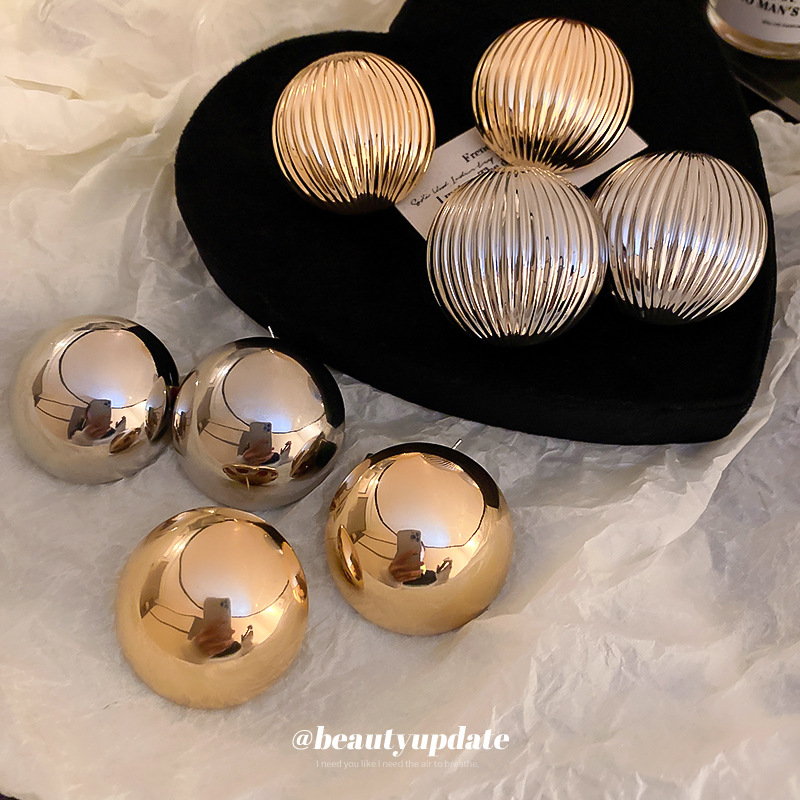 La aguja de plata rayó los pendientes europeos y americanos del semicírculo del metal de la industria pesada del diseño de los pendientes del nicho exageró los pendientes de alto grado para las mujeres