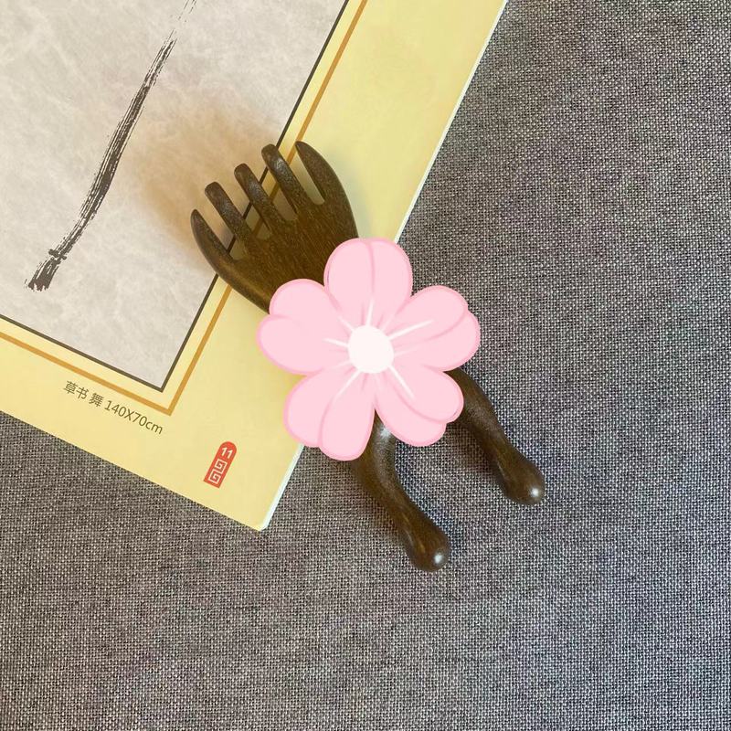 鹿の角の頭部の経絡のマッサージ器のマッサージ器は頭をつかんで治療します。|undefined