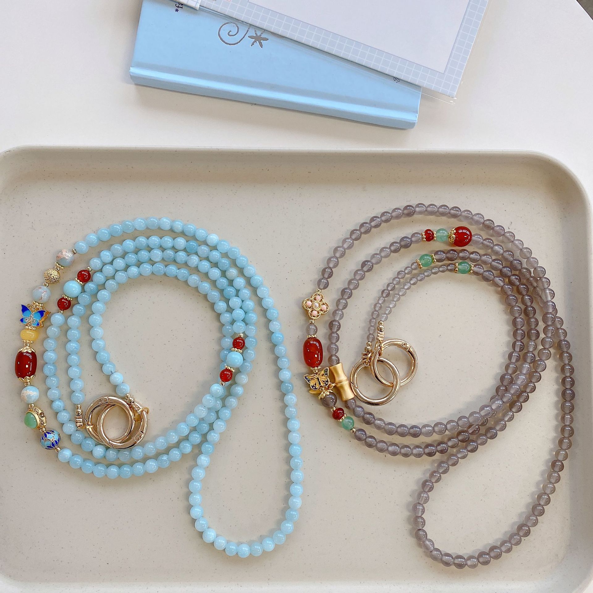 Boutique hecho a mano de alta gama para teléfono móvil cadena larga de ágata cloisonné femenina cordón de teléfono móvil de moda colgante de mensajero largo