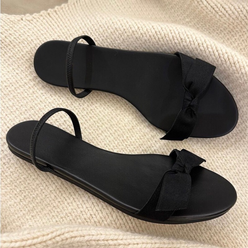 Black Flat One-Strap Sandals for Women, 2026 Summer New Fairy Style with Bow, Versatile Two-Way Wear, Trendy Slippers Black Flat One-Strap Sandals for Women, 2026 Summer New Fairy Style with Bow, Versatile Two-Way Wear, Trendy Slippers