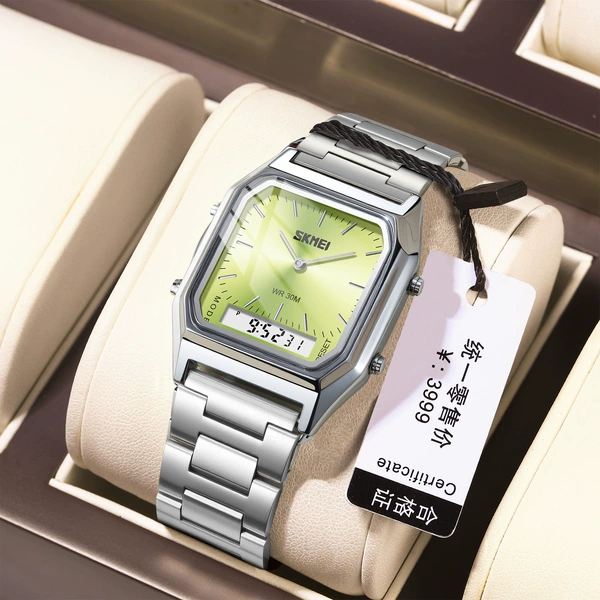 Silver shell green face