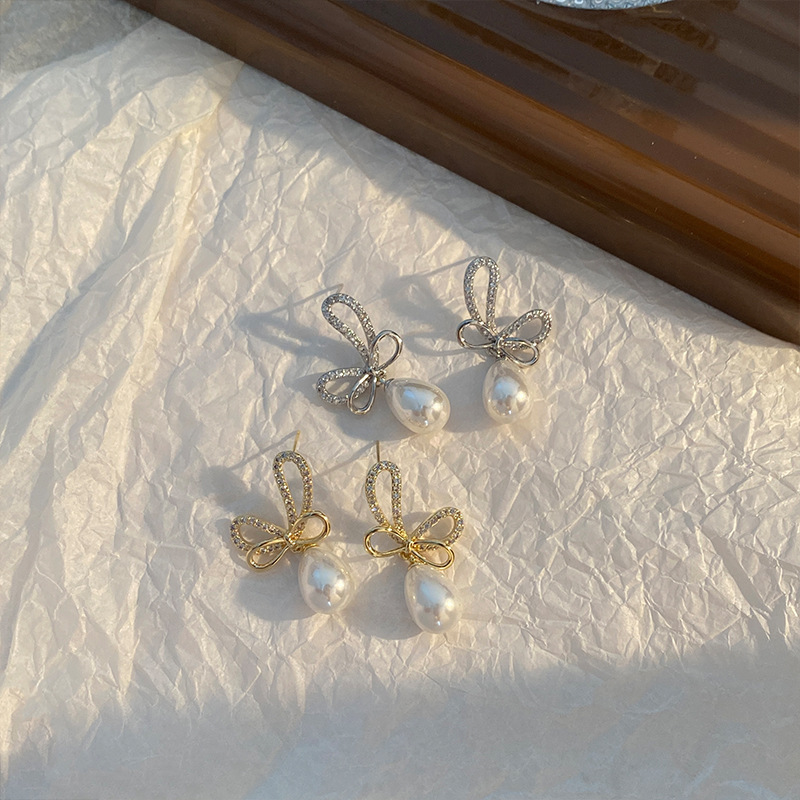 Long elegant cute earrings pearl with bow