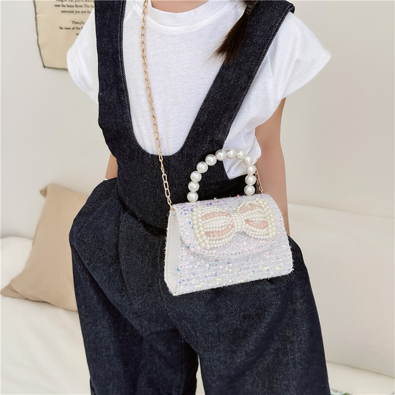 2025 nuevo pequeño viento perfumado bolso de niños princesa viento beaded bolso de cambio de mano bolso de hombro de moda bolso de cadena