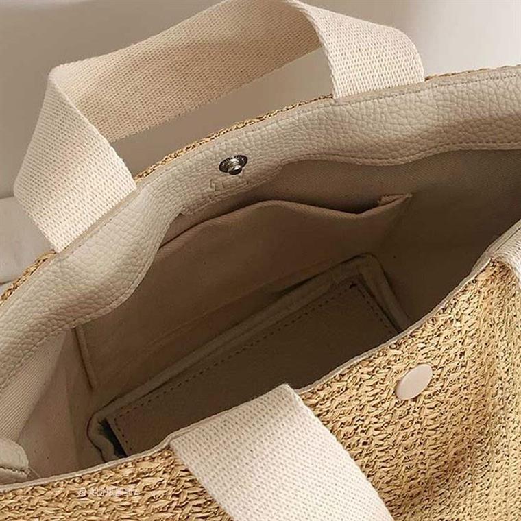 Nieuwe Bucket Ins Designer Stijl Zomer Strand Uitje Geweven Vintage Handtas van Geweven Stro Sanmi Niche Design_voghion.com