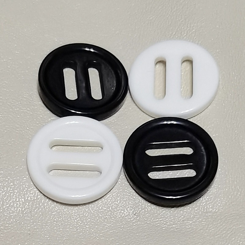 树脂钮扣黑色日字扣23mm三档扣塑胶长眼条圆形双孔过检针厂家批发