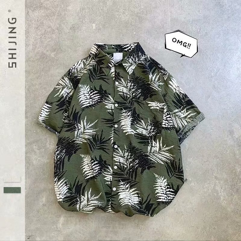 Estilo retro de Hong Kong Ruan guapo camisa de seda de hielo abrigo ropa de los hombres Hawaii playa floral camisa de manga corta de los hombres sueltos más tamaño