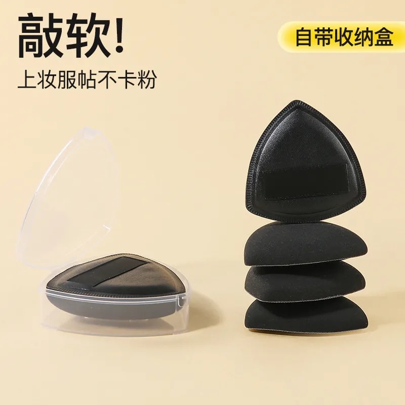 Esponja triangular negra para maquillaje que no absorbe polvo, base de maquillaje tipo marshmallow, herramientas de belleza profesionales al por mayor, venta transfronteriza de gran éxito.