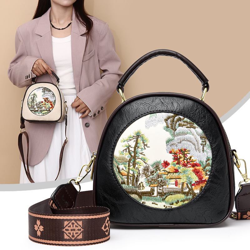 Transfronterizos ocio de cuero suave bolsas redondas versátiles exquisitas retro bolsas de hombro inclinadas de gran capacidad nuevas bolsas de mamá chinas