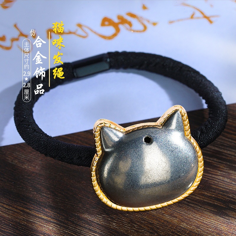 宋錦藍染刺繍部品のネジの下に髪を支えて布を包みます。|undefined