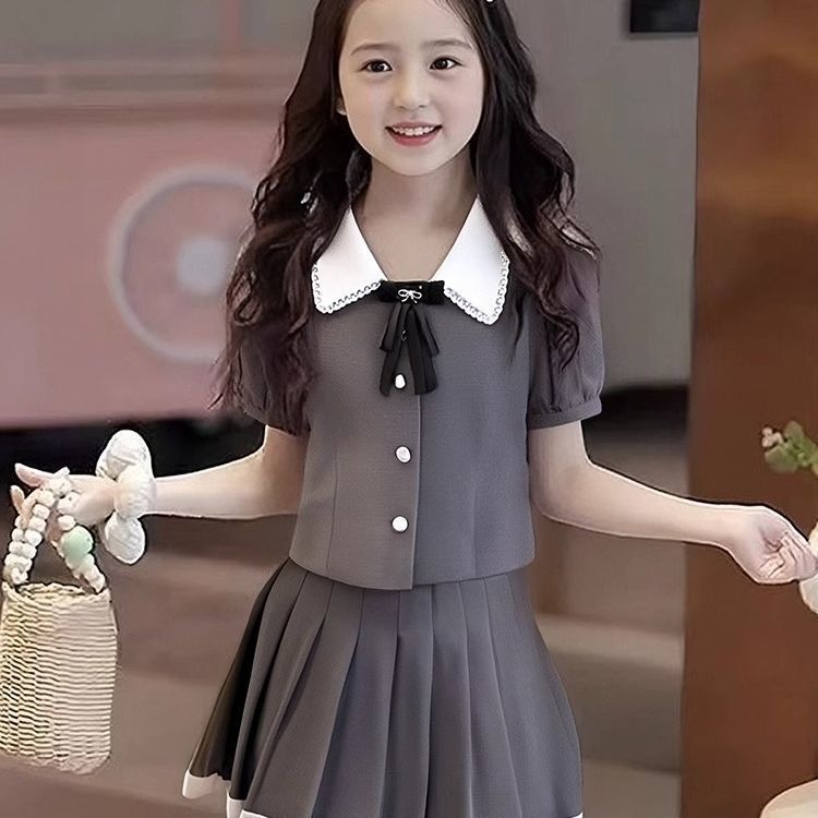 女の子スーツ夏服 2025 新しい韓国カレッジスタイルリボンファッショナブルな半袖トッププリーツスカート 2 点セット|undefined