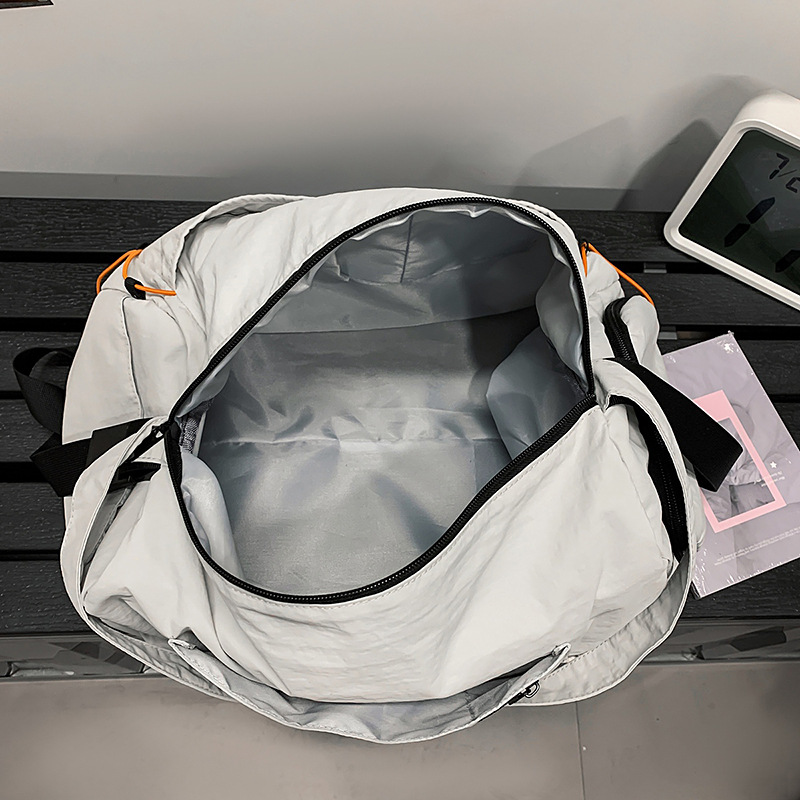 Bolsa de viaje de gran capacidad de verano 2025 nuevo viaje corto de acondicionamiento físico viaje de negocios bolsa de mano impermeable