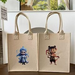 新型のどこがフェルトのハンドバッグを厚くして材質の創意的なプリントの漫画の手の贈り物の袋の収納袋を厚くします。
