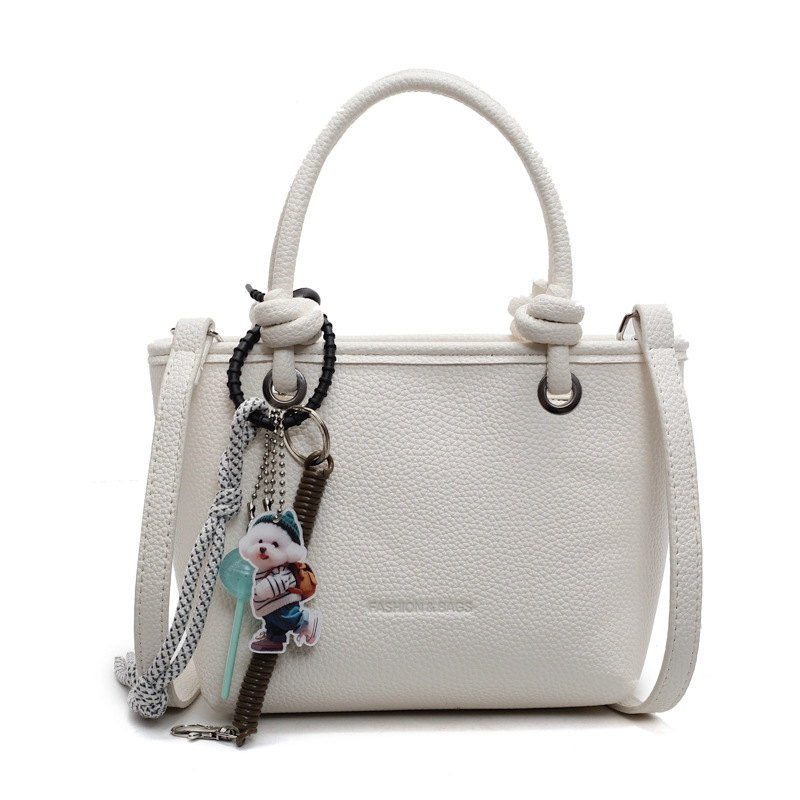 Bolso de cubo portátil para mujer, nuevo bolso de mensajero de textura salvaje 2025, bolso de canasta de verduras de moda retro de alta gama