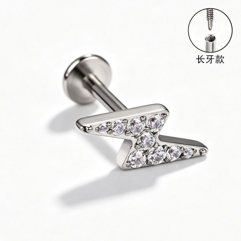 Silver pointed spike labret stud material detail