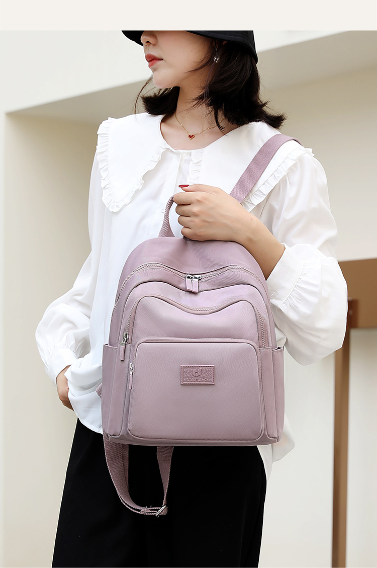 Colorful Fox's new backpack, a large-capacity casual backpack for women, is water-resistant and multi-layered for travel students undefined