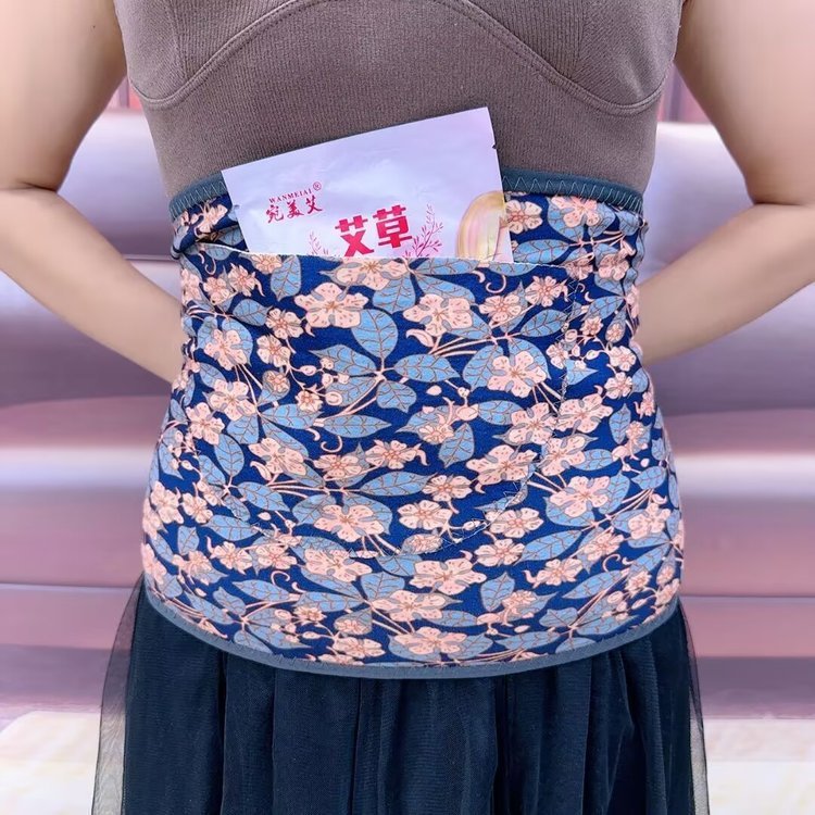 絨徳保温腰をかばっている男性女性は腹部を修理してお腹を温めます。|undefined