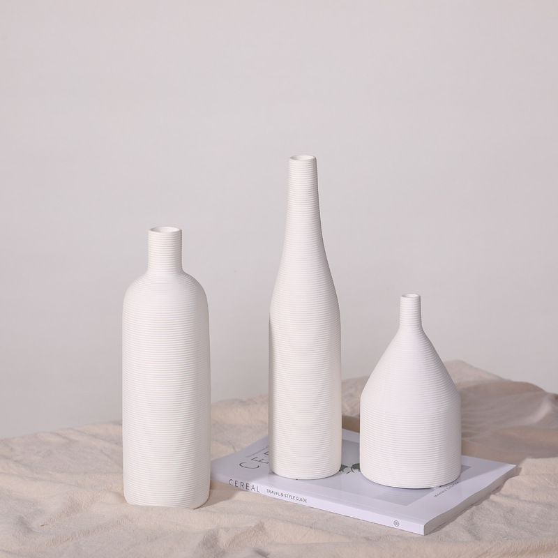 Nordic ins florero de cerámica blanca simple sala estar creativa flor seca arreglo decoración suave accesorios para el hogar al por mayor