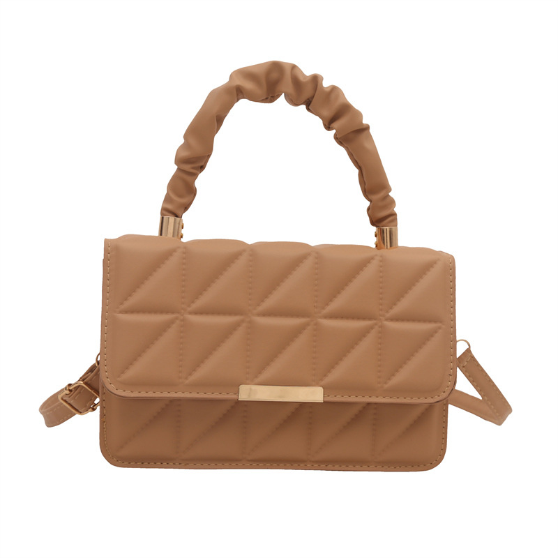 Minimalista bolso de viaje de viento 2024 engolpeado diamante otoño nuevo diseño de bolso de hombro simple estilo bolso de mochila