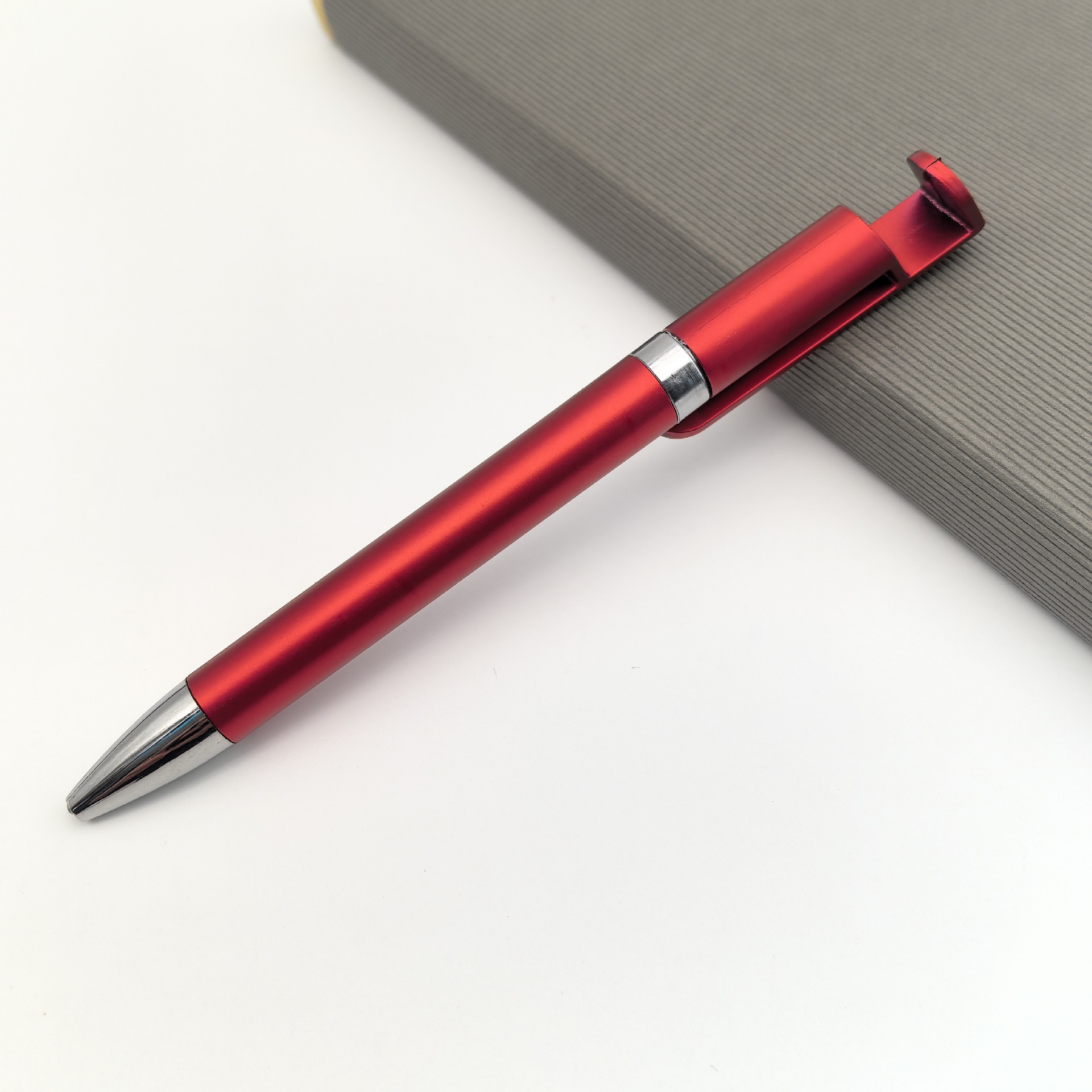 Bolígrafo de soporte para teléfono móvil multifunción Bolígrafo de regalo al por mayor Bolígrafo de plástico retorcido personalizado Bolígrafo publicitario de soporte para teléfono móvil