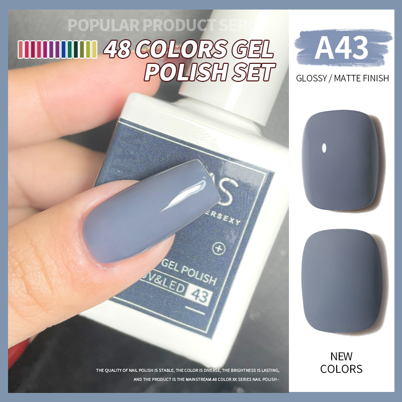 Una botella de pegamento de esmalte de uñas de un color 2022 nuevo verano popular 48-color Pequeño conjunto para el salón de uñas traje completo