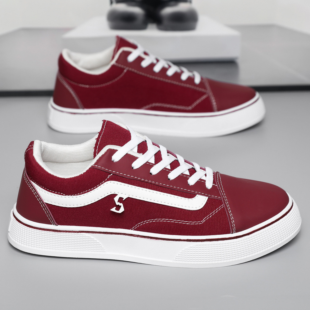 Zapatos de lona de otoño nuevos zapatos casuales transpirables bajos zapatos escolares clásicos coreanos zapatos de tela a cuadros negros zapatos de skate para hombres