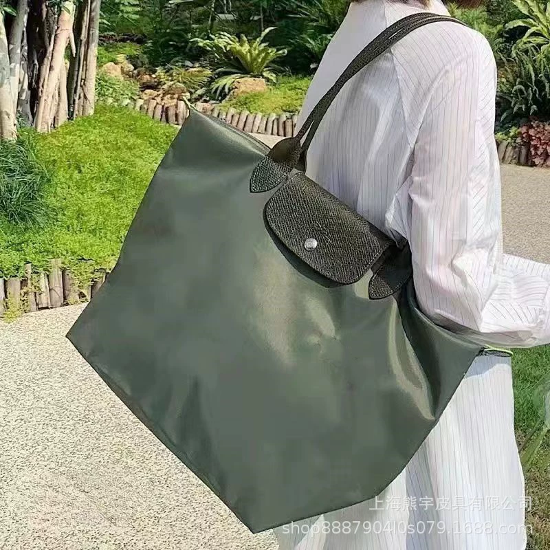 Foldable capacious purse for mother and baby, one-shoulder bag