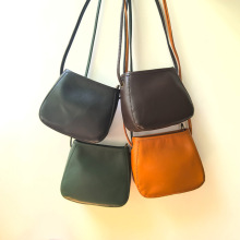 新款头层牛皮休闲简约流行通勤植鞣皮小包包马蹄包时尚百搭真皮包