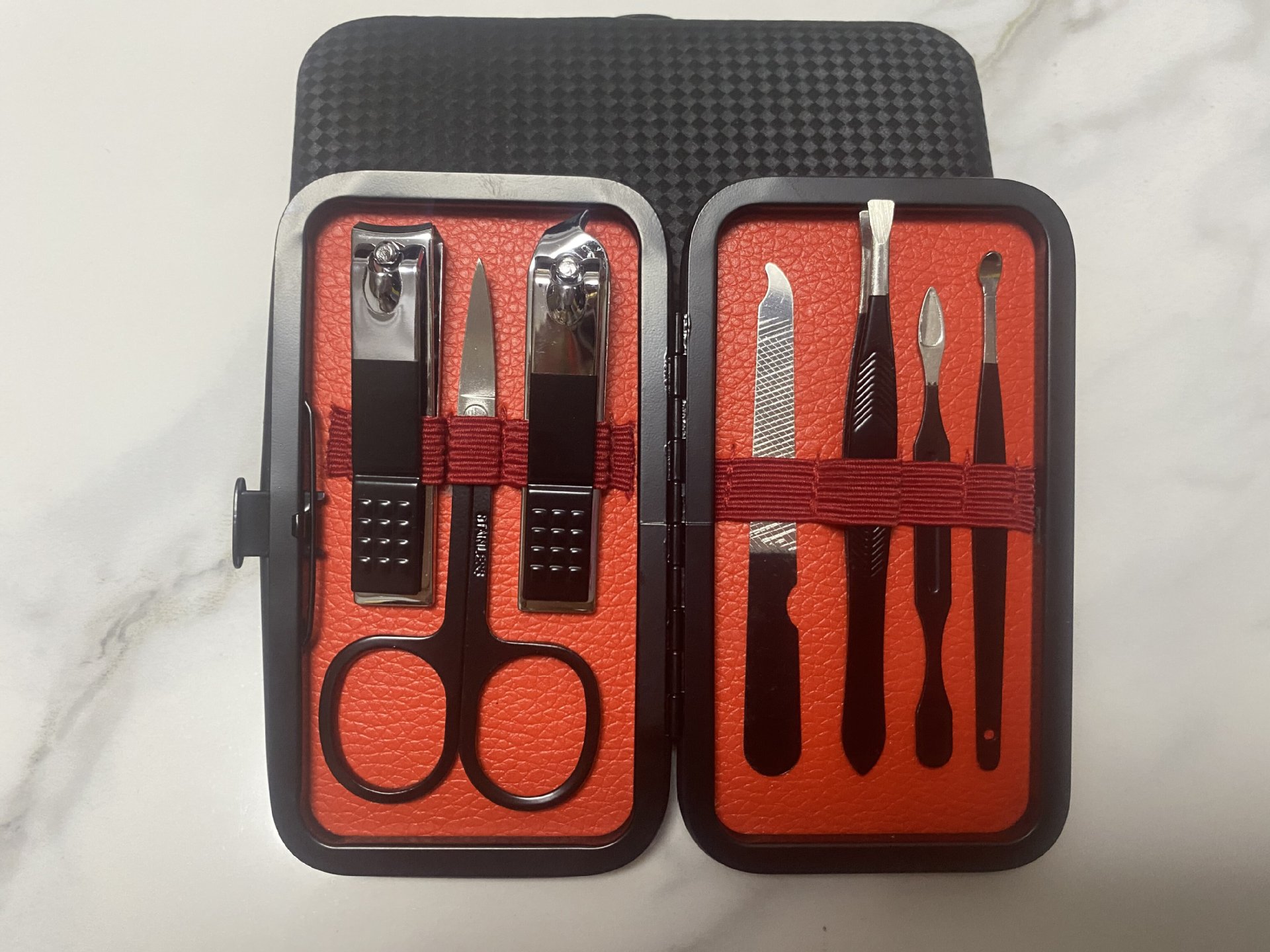 Nuevo juego de cortaúñas semi-negras de gama alta transfronterizo alemán juego completo de 7-24 piezas de herramientas de uñas de acero inoxidable en stock