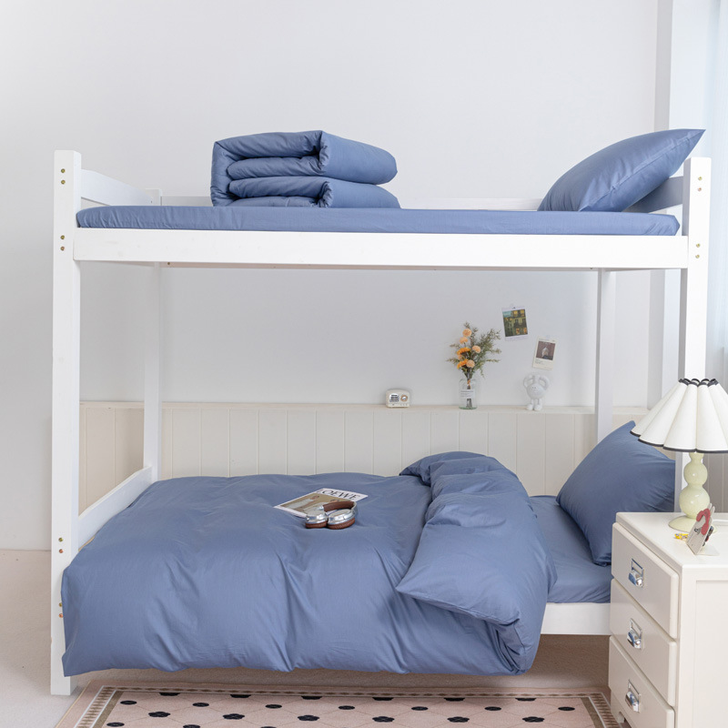 Cama de algodón de color puro para estudiantes universitarios de tres piezas dormitorio de algodón puro sábana individual funda de edredón ropa de cama 2025 nuevo estilo