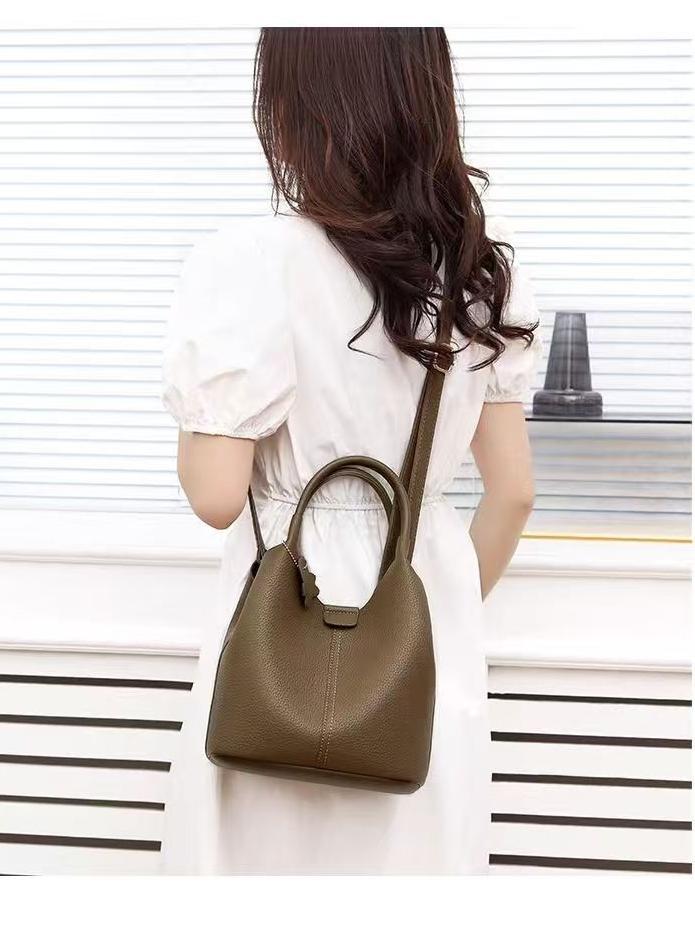 Bolso de cubo de mano casual de color sólido de comercio exterior 2025 nuevo bolso de hombro simple de todo fósforo bolso de mensajero de cuero suave de alta calidad