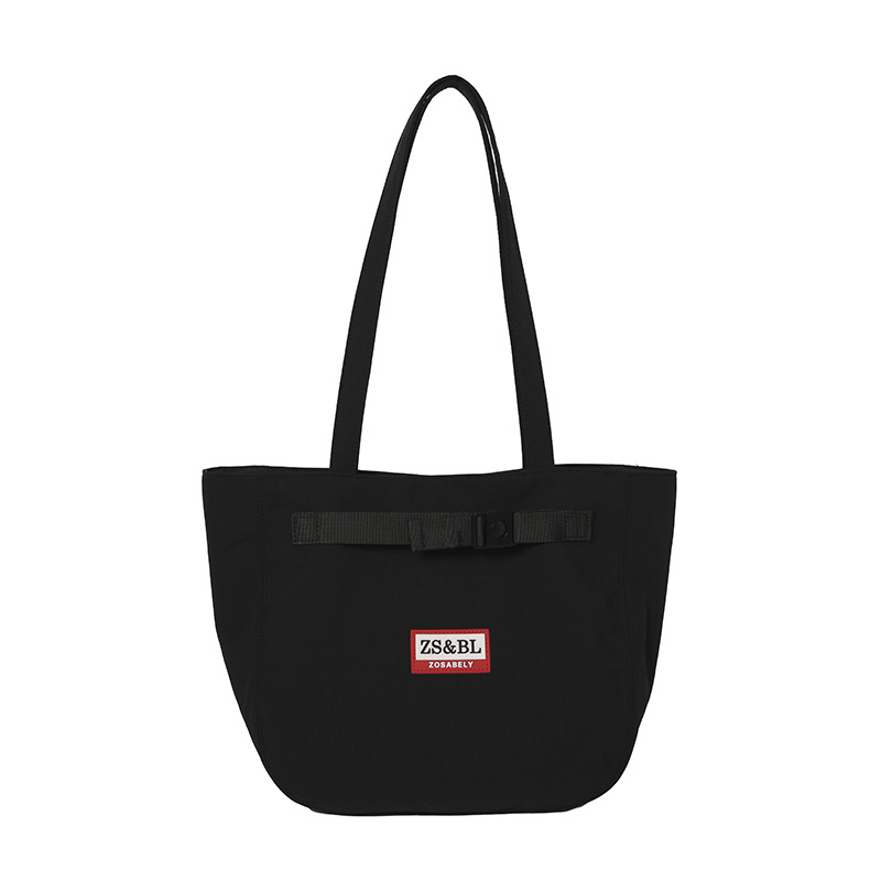 Bolso de letras coreanas 2025 verano nuevo bolso femenino bolso de lona para estudiantes bolso de hombro casual de gran capacidad