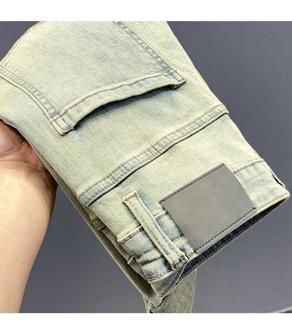 Jeans slim fit uomo in stile retro con strass ed elasticizzate_voghion.com