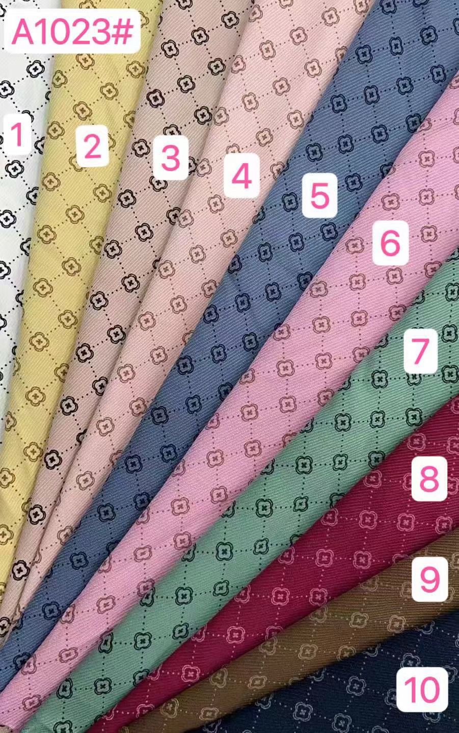 现货斜纹胶印布料格子服装箱包帽子头饰品面料有垂感工装