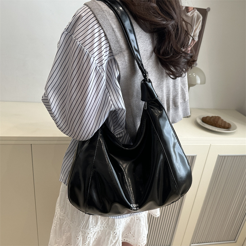 relajado cera de piel bolso de mujer 2025 nuevo estilo primavera y verano de moda de viaje bolsa de mano ocio versátil mochila