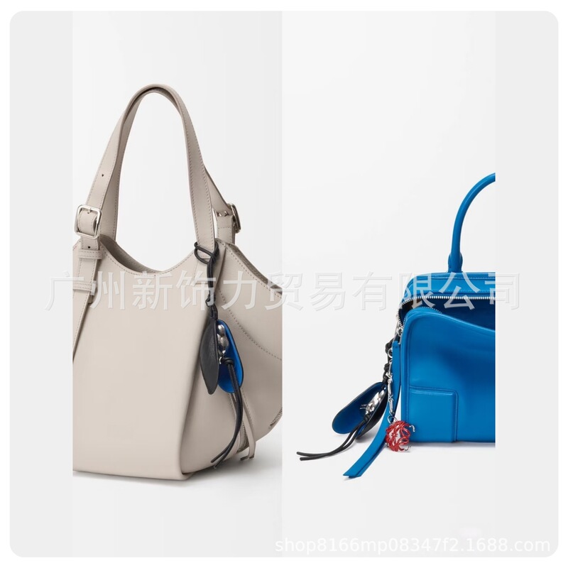 Cowhide Shell Pendant Suitable for Loewe Bags, Genuine Leather Keychain, Luggage Accessories, Bag Pendant with a High-End Feel Cowhide Shell Pendant Suitable for Loewe Bags, Genuine Leather Keychain, Luggage Accessories, Bag Pendant with a High-End Feel