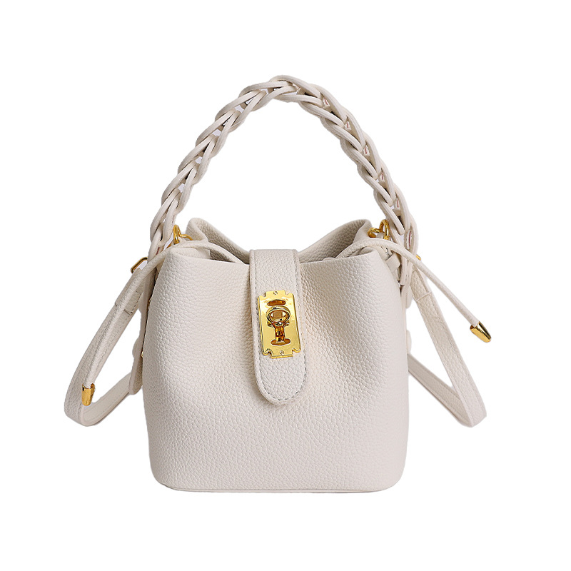 Bolsos de balde portátiles de alta calidad para mujeres 2026 verano nuevo lichi estampado viaje diario ocio versátil mochila