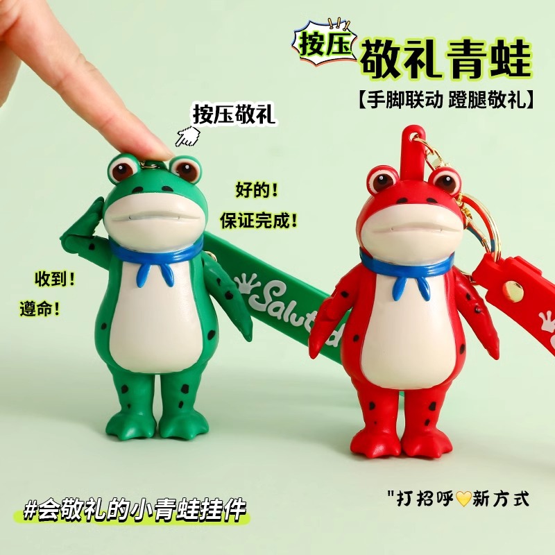 Saludo explosivo rana llavero de automóvil adorable pareja colgante en línea rana muñeca colgante regalos al por mayor