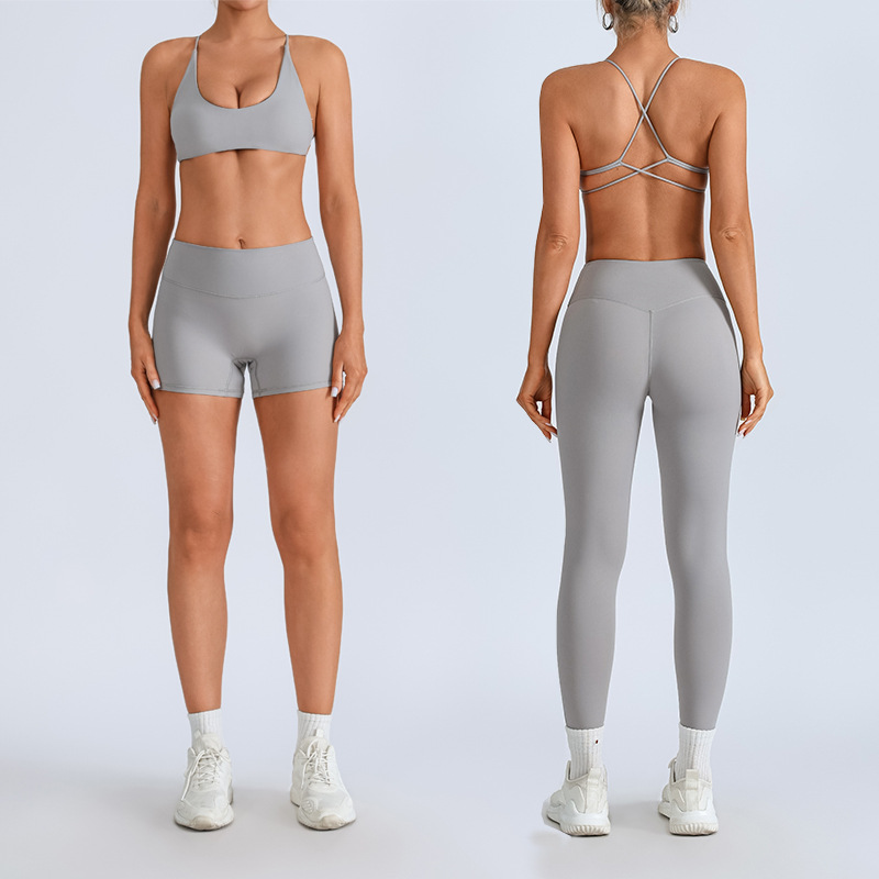 Traje de yoga europeo y americano transfronterizo, espalda hermosa con almohadilla para el pecho, sujetador con tirantes cruzados, pantalones deportivos de secado rápido de melocotón de cintura alta