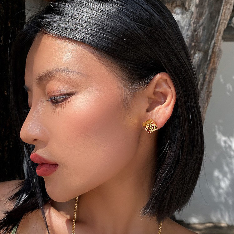 Luo Jia same style brass gold-plated solid stud earrings female temperament light luxury niche design sense high quality European and American earrings batch