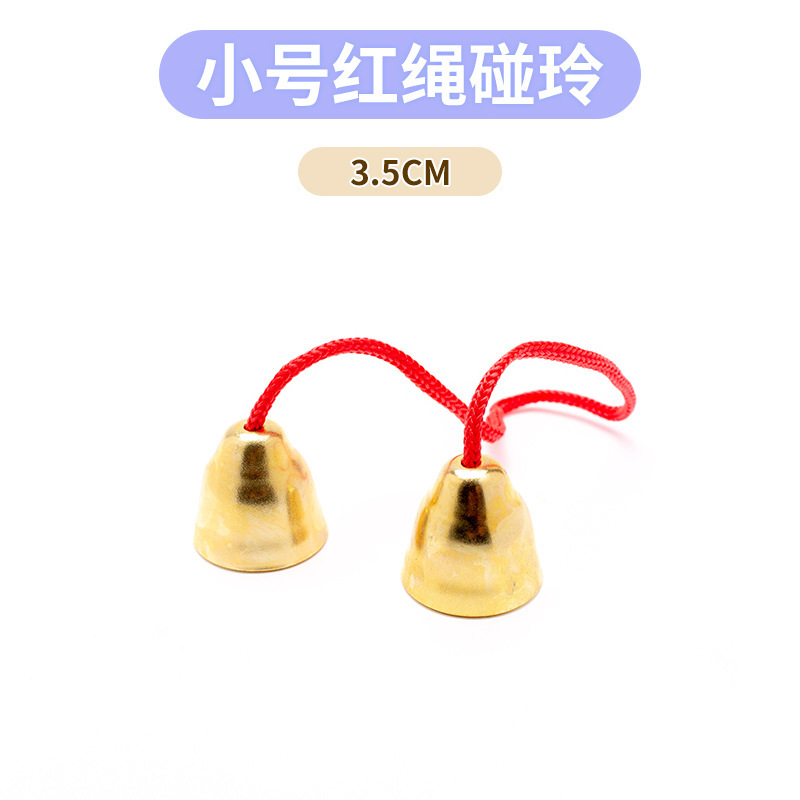 A pair of small red rope bells