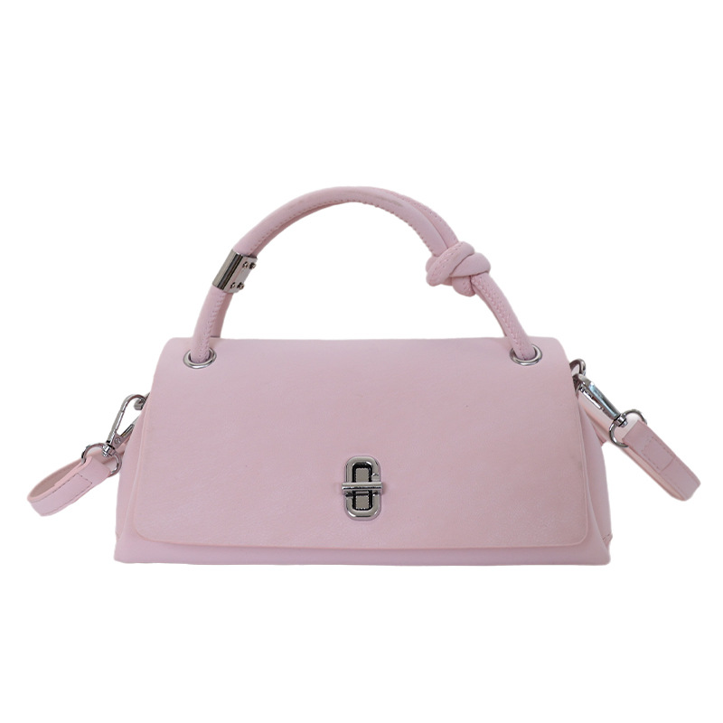 Bolso de mano simple de alto valor para mujeres verano 2026 nueva moda ocio atmósfera de viaje mochila de hombro
