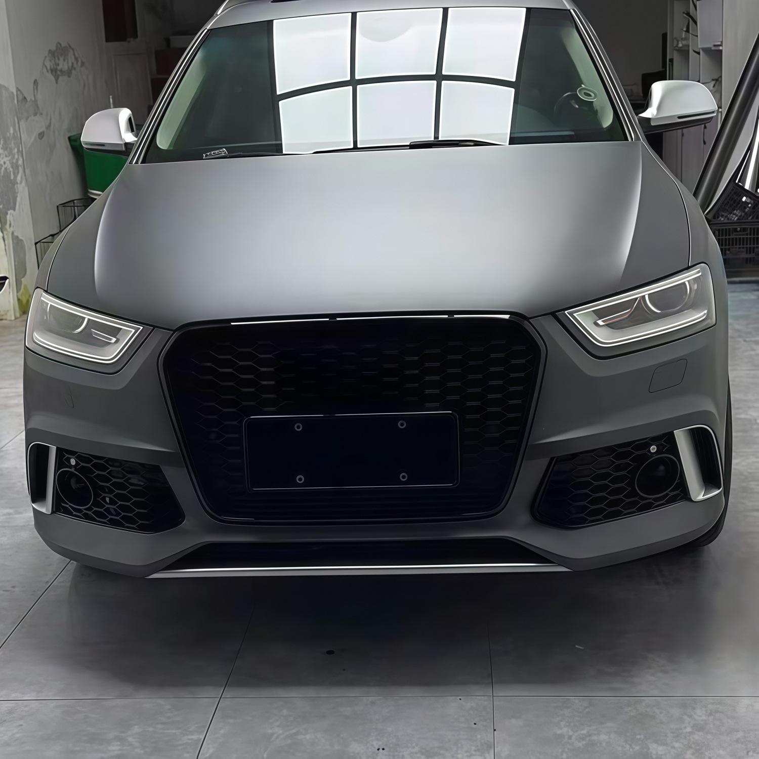 Suitable for Audi Q3 models from 2012-2015, this is an RS Q3-style front bumper, front grille, and front fascia kit