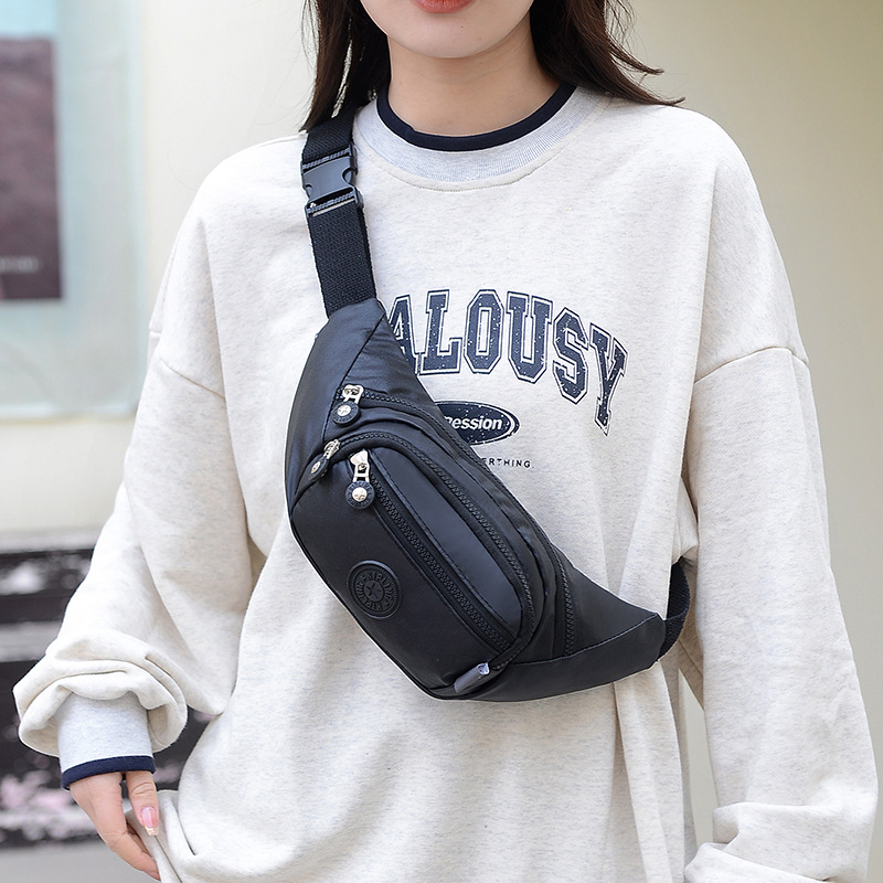 2023 nuevo bolso de pecho bolso crossbody bolso de hombro de tela impermeable brillante pequeño mono colgante de compras bolso de pecho Live Streaming drenaje