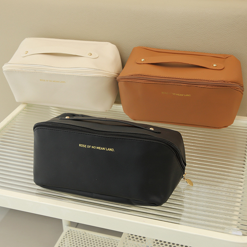 网红化妆包ins风琴枕头包便携式手提旅行收纳包大容量PU 洗漱女包