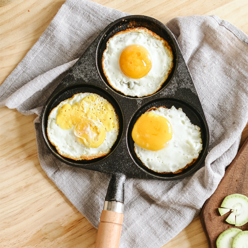 Hogar de tres agujeros de hierro fundido huevo sartén huevo hamburguesa máquina huevo dumpling pan huevo freír máquina molde de la torta sartén antiadherente