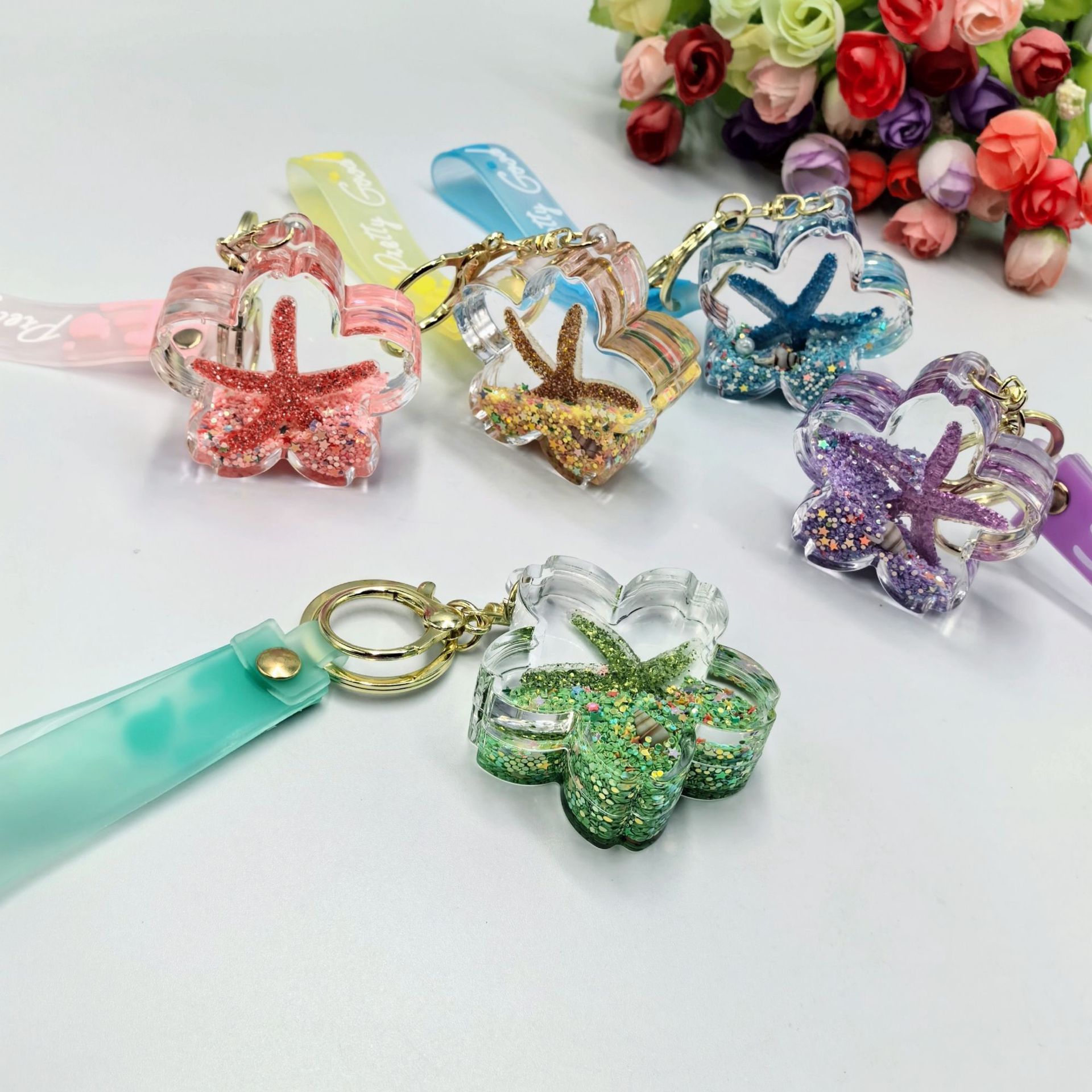 Petróleo estrellas de mar concha flor acrílico arenas flotantes colgante llavero de moda boutique colgante bolsos creativos colgante